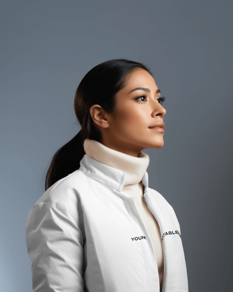 side-view-of-a-hispanic-woman-wearing-a-warm-jacket-in-front-of-white-screen-04